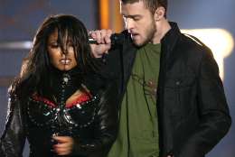 FILE - In this Feb. 1, 2004 file photo, singers Justin Timberlake and Janet Jackson are seen during their performance prior to a wardrobe malfunction during the half time performance at Super Bowl XXXVIII in Houston. The Supreme Court decided Friday not to consider reinstating the government's $550,000 fine on CBS for Janet Jackson's infamous breast-bearing "wardrobe malfunction" at the 2004 Super Bowl. (AP Photo/David Phillip, file)