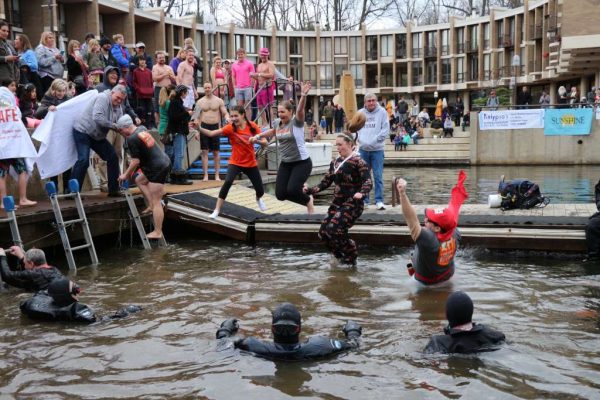 The water in Lake Anne was 38 degrees Saturday, but that didn’t stop nearly 200 people from making a “splash” for charity. (Courtesy Reston Now)
