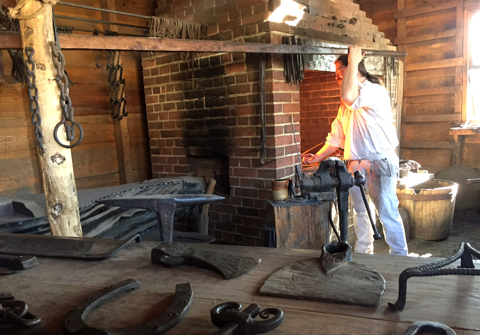 A blacksmith works at the forge at Mount Vernon on Monday, Feb. 20, 2017. (WTOP/Rich Johnson)