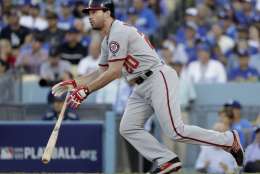 FILE - In this Oct. 11, 2016, file photo, Washington Nationals' Daniel Murphy watches his two-run single during the seventh inning against the Los Angeles Dodgers in Game 4 of National League Division Series, in Los Angeles. Murphy, Kris Bryant and Corey Seager are up for the National League Most Valuable Player award.(AP Photo/Jae C. Hong, File)