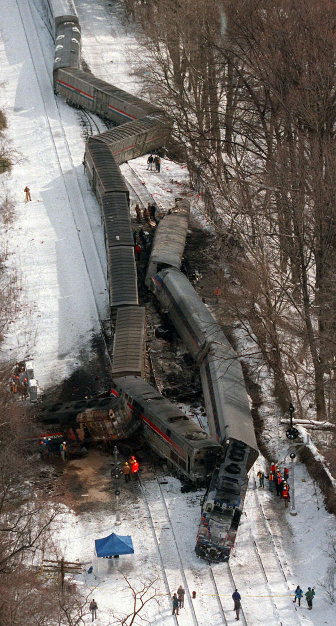 The MARC train, right,  and an Amtrak train that collided Friday, Feb. 16, 1996  in Silver Spring, Md., are seen in this aerial view Saturday, Feb. 17, 1996.  (AP Photo/Doug Mill)