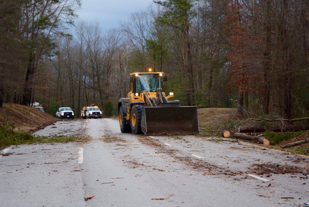 St. Charles Parkway reopens, though front-end loaders were still ramming storm debris to the wayside, following a storm on Feb. 25, 2017. (WTOP/Dave Dildine)