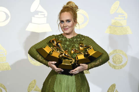 Adele sweeps Grammys with 5, while the late David Bowie wins 5