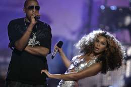 Beyonce Knowles, right, is joined by boyfriend Jay-Z as they perform during the 6th annual BET Awards on Tuesday, June 27, 2006, in Los Angeles.  (AP Photo/Chris Carlson)