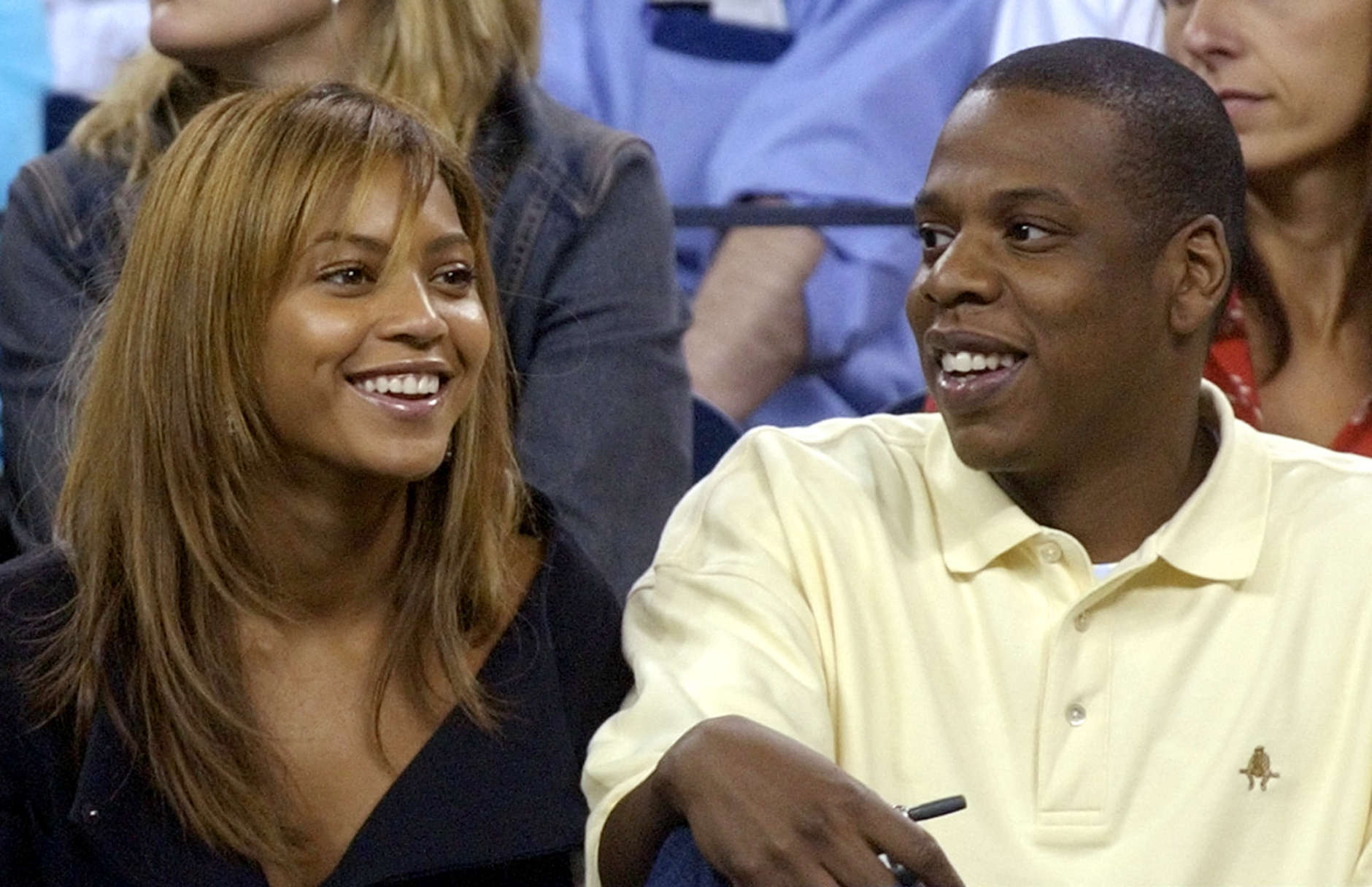 Singer Beyonce Knowles, left, and rapper Jay-Z, watch the match between Lindsay Davenport, of the United States, and Kim Clijsters, of Belgium, at the U.S. Open tennis tournament in New York, Friday, Sept. 5, 2003.  (AP Photo/Elise Amendola)