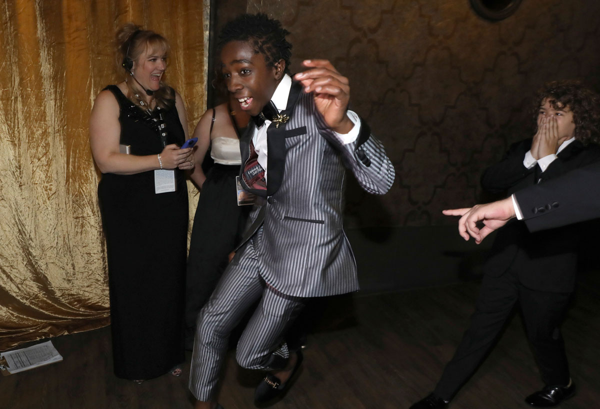 Caleb McLaughlin, left, and Gaten Matarazzo appear backstage after accepting the award for outstanding performance by an ensemble in a drama series for "Stranger Things" at the 23rd annual Screen Actors Guild Awards at the Shrine Auditorium & Expo Hall on Sunday, Jan. 29, 2017, in Los Angeles. (Photo by Matt Sayles/Invision/AP)