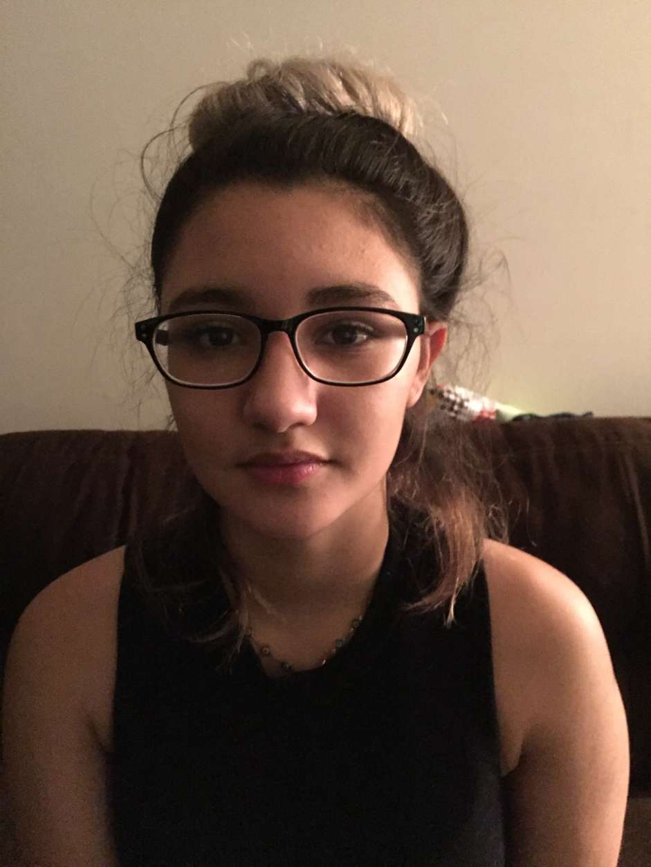 Missing Fairfax County teenager Lizzy Rivera Colindres is described as about 5 feet 6 inches, 125 pounds. She has long black hair with light-colored strips. She wears glasses. (Courtesy Fairfax County Police Department)