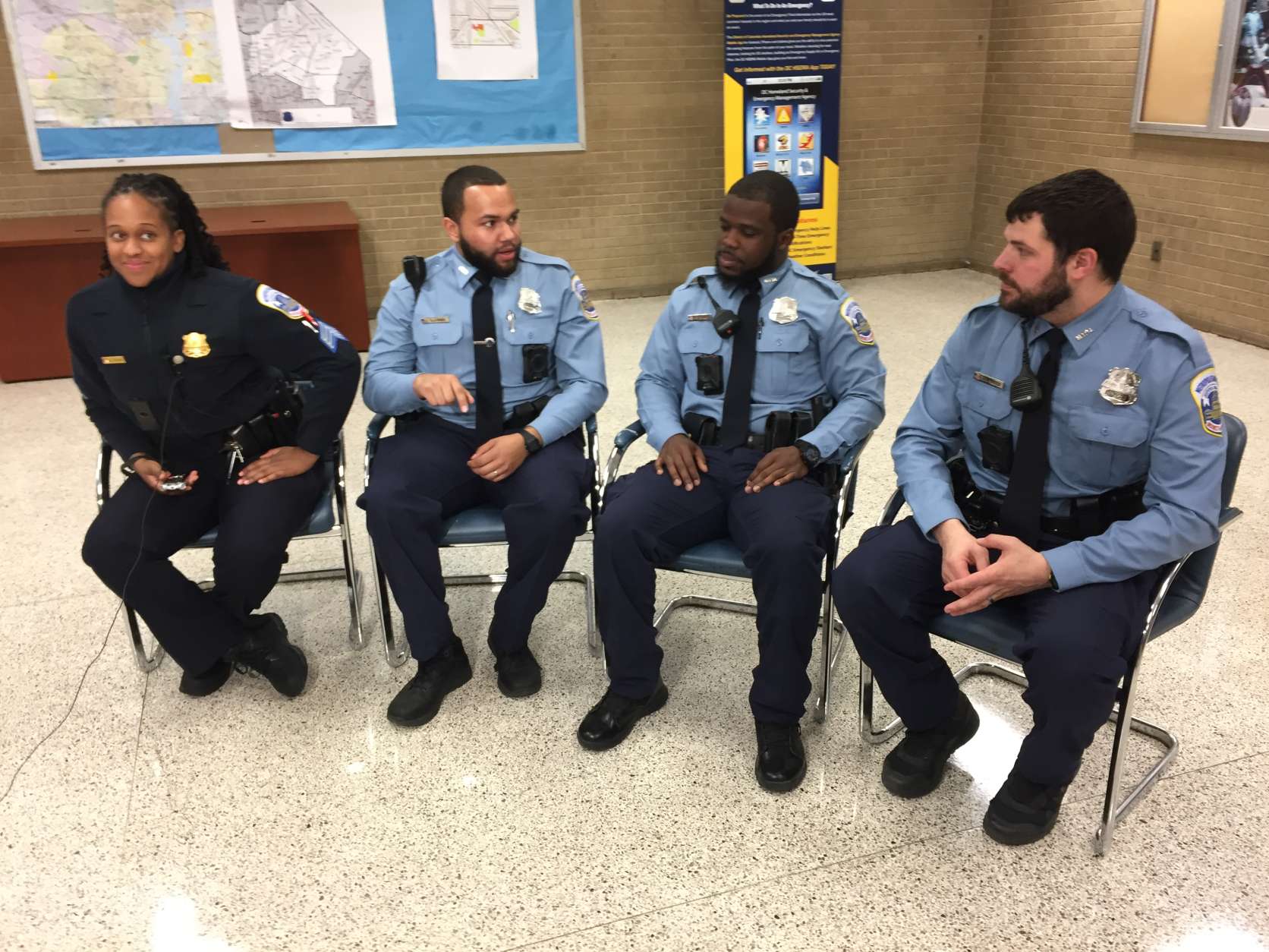 Left to right: D.C. Police Sgt. Nicole Brown, and Officers Steven Hines, Jacoby Taylor and John Hayes. They all responded to the scene of a fiery Monday night car crash on Bladensburg Road Northeast. (WTOP/Michelle Basch)