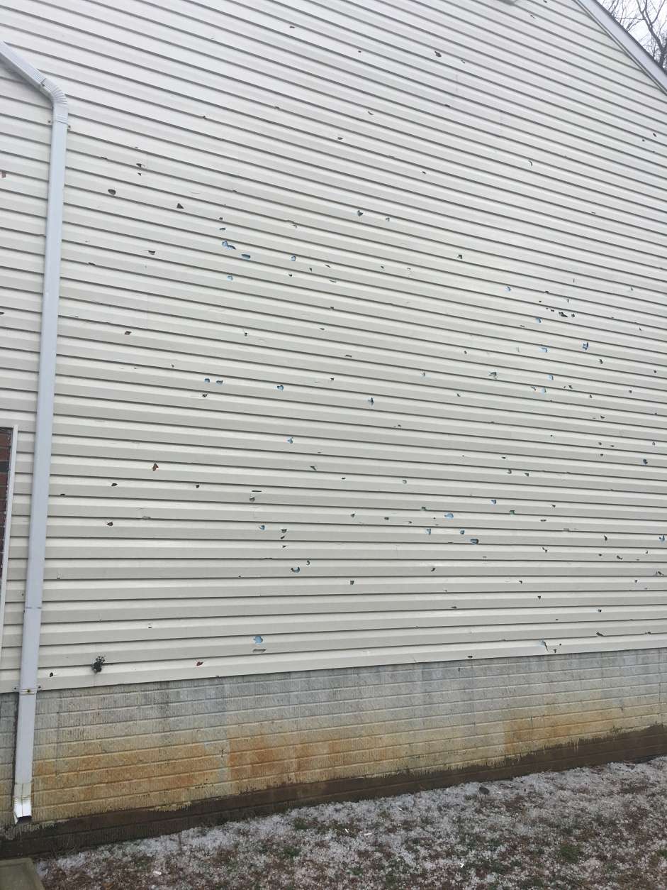 Hail causes damage to the side of a building on Saturday, Feb. 25, 2017. (Courtesy Christus Gruters)