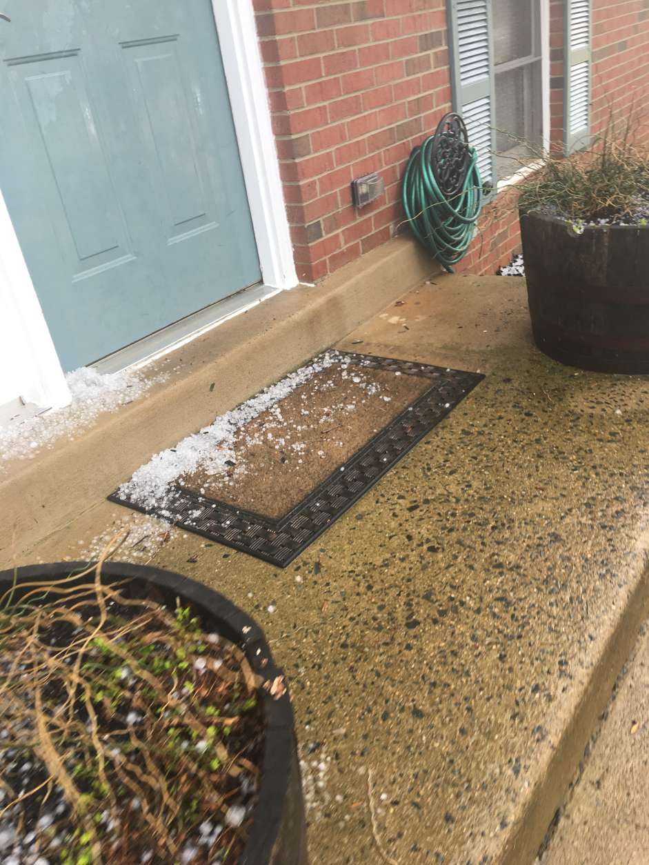 Hail piles up on the doorstep of a home in Stafford County, Virginia. (Courtesy Christus Gruters)