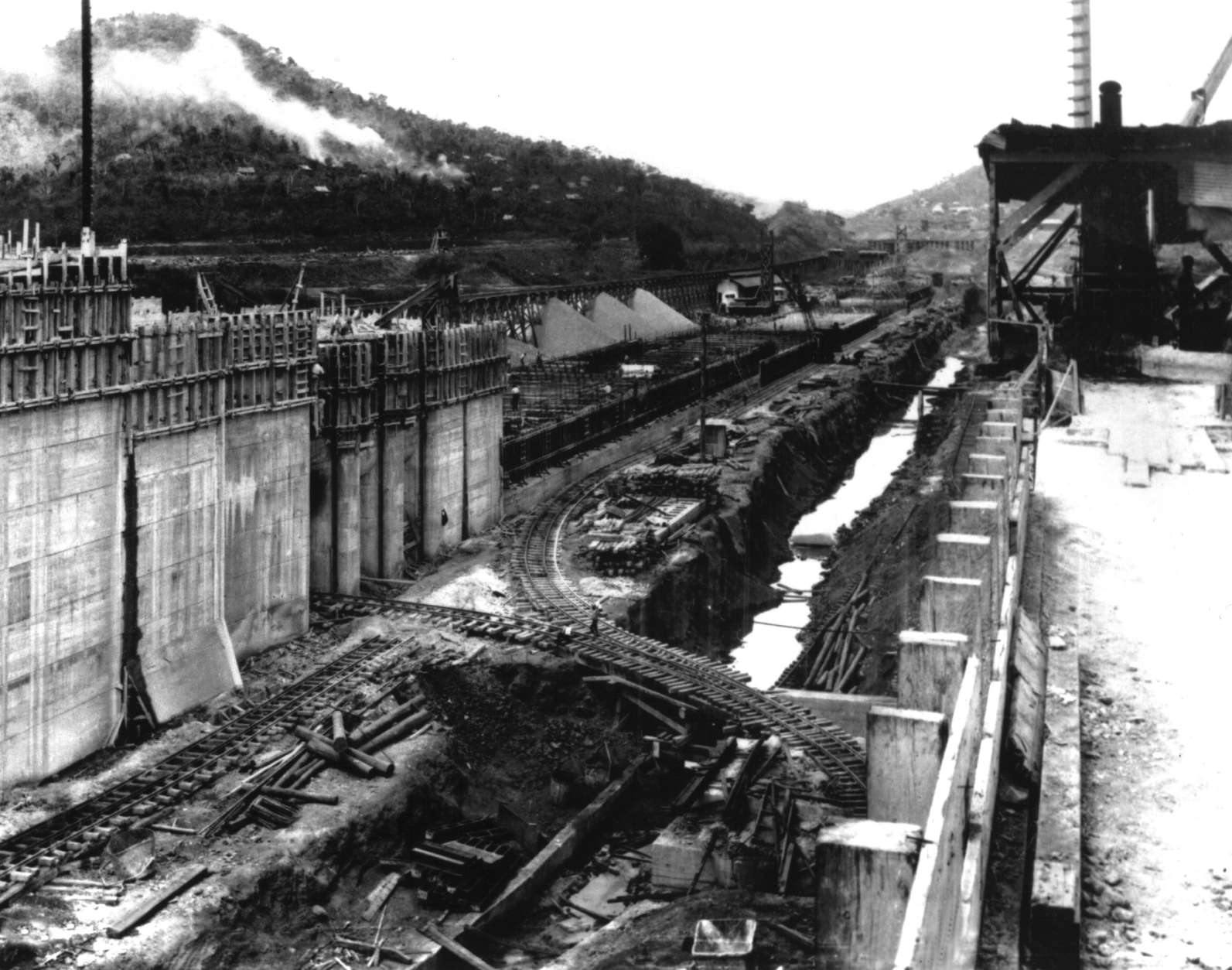 The Pedro Miguel Locks of the Panama Canal are pictured under construction in the Panama Canal Zone on June 9, 1912.  The 51-mile-long canal, which opened on Aug. 14, 1914, was comprised of six locks and became a short-cut for sea passage between North and South America.  At a cost of $352 million, the construction utilized some 40,000 workers under the direction of engineer George Washington Goethals. (AP Photo)