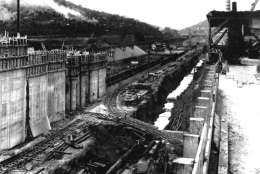 The Pedro Miguel Locks of the Panama Canal are pictured under construction in the Panama Canal Zone on June 9, 1912.  The 51-mile-long canal, which opened on Aug. 14, 1914, was comprised of six locks and became a short-cut for sea passage between North and South America.  At a cost of $352 million, the construction utilized some 40,000 workers under the direction of engineer George Washington Goethals. (AP Photo)