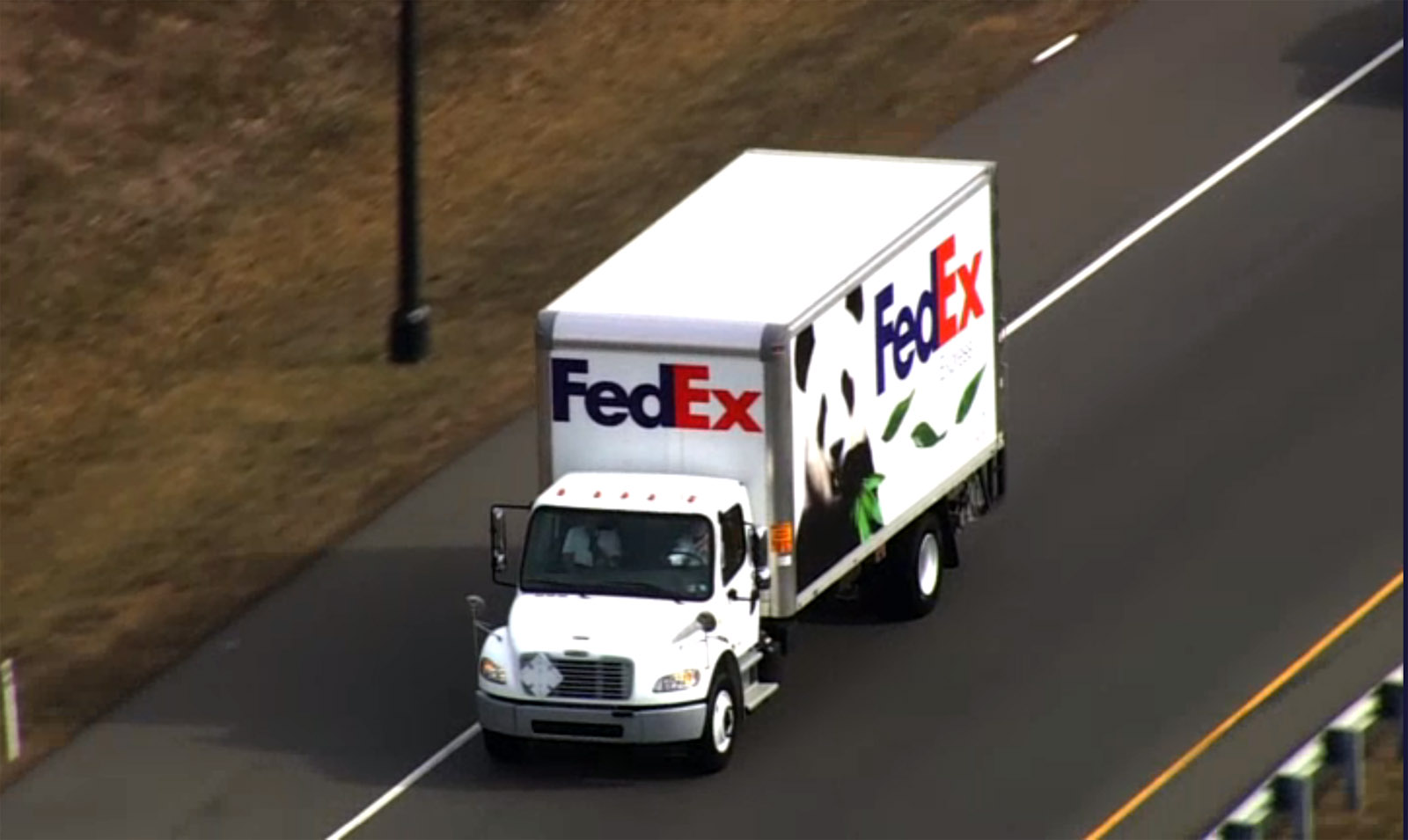 Giant panda Bao Bao travels by a FedEx truck to Dulles International Airport, where she will board a cargo plane bound for China on Tuesday, Feb. 21, 2017. (Courtesy NBC Washington)