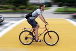 **ADVANCE FOR MONDAY, SEPT. 15, AND THEREAFTER** Eric Hultgren, 22, a senior at UMass-Lowell, rides his bicycle on campus in Lowell, Mass. Friday, August 1, 2008. Hultgren can't afford high gasoline prices, so he's ditched his car for a Mongoose 8-speed. (AP Photo/Elise Amendola)