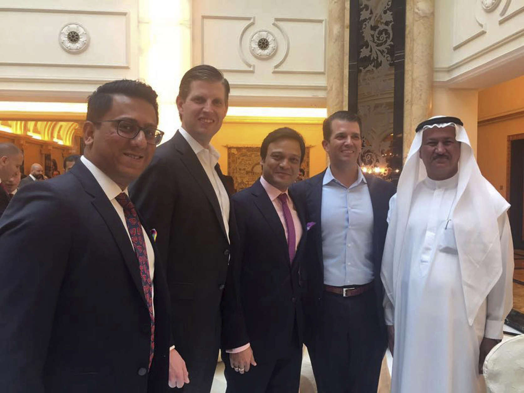 Banke International director Niraj Masand, far left, poses for a photo with Eric Trump, second left, Banke International director Porush Jhunjhunwala, center, Donald Trump Jr., second right, and DAMAC Properties chairman Hussain Sajwani, during festivities marking the formal opening of the Trump International Golf Club, in Dubai, United Arab Emirates, Saturday Feb. 18, 2017. 

Two of U.S. President Donald Trump's sons arrived in the UAE for an invitation-only ceremony Saturday to formally open the club. (AP Photo)