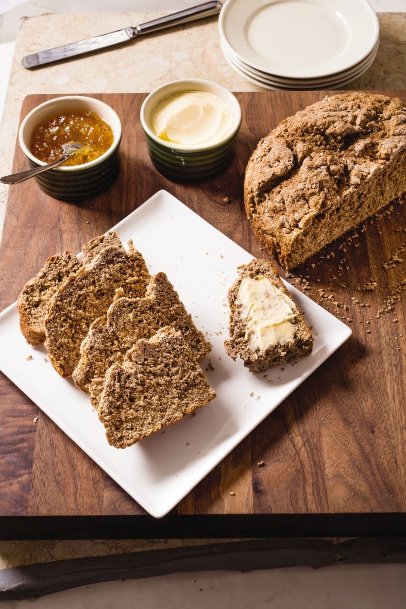 This undated photo provided by America's Test Kitchen in March 2019 shows Irish brown soda bread displayed in Boston. This recipe appears in the cookbook "All-Time Best Brunch." (Carl Tremblay/America's Test Kitchen via AP)