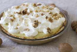 This Oct. 27, 2014 photo shows penuche cream pie in Concord, N.H. It is important to assemble this pie only just before serving; the penuche will soften once the custard layer is added. (AP Photo/Matthew Mead)