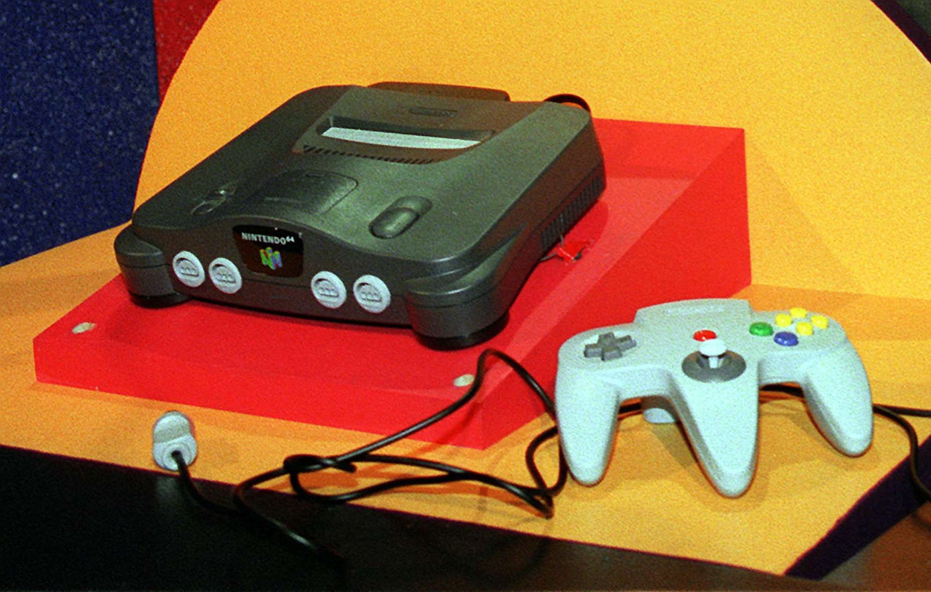 The newly unveiled Nintendo 64 video, the world's first true 64-bit home video game, is displayed during a news conference  Wednesday, May 15, 1996, in Los Angeles. The introduction of the Nintendo system will be a big event as developers and marketers gather in Los Angeles for the Electronic Entertainment Expo. Nintendo 64 will be available for a manufacturer's suggested retail price of $249.95. (AP Photo/Kevork Djansezian)
