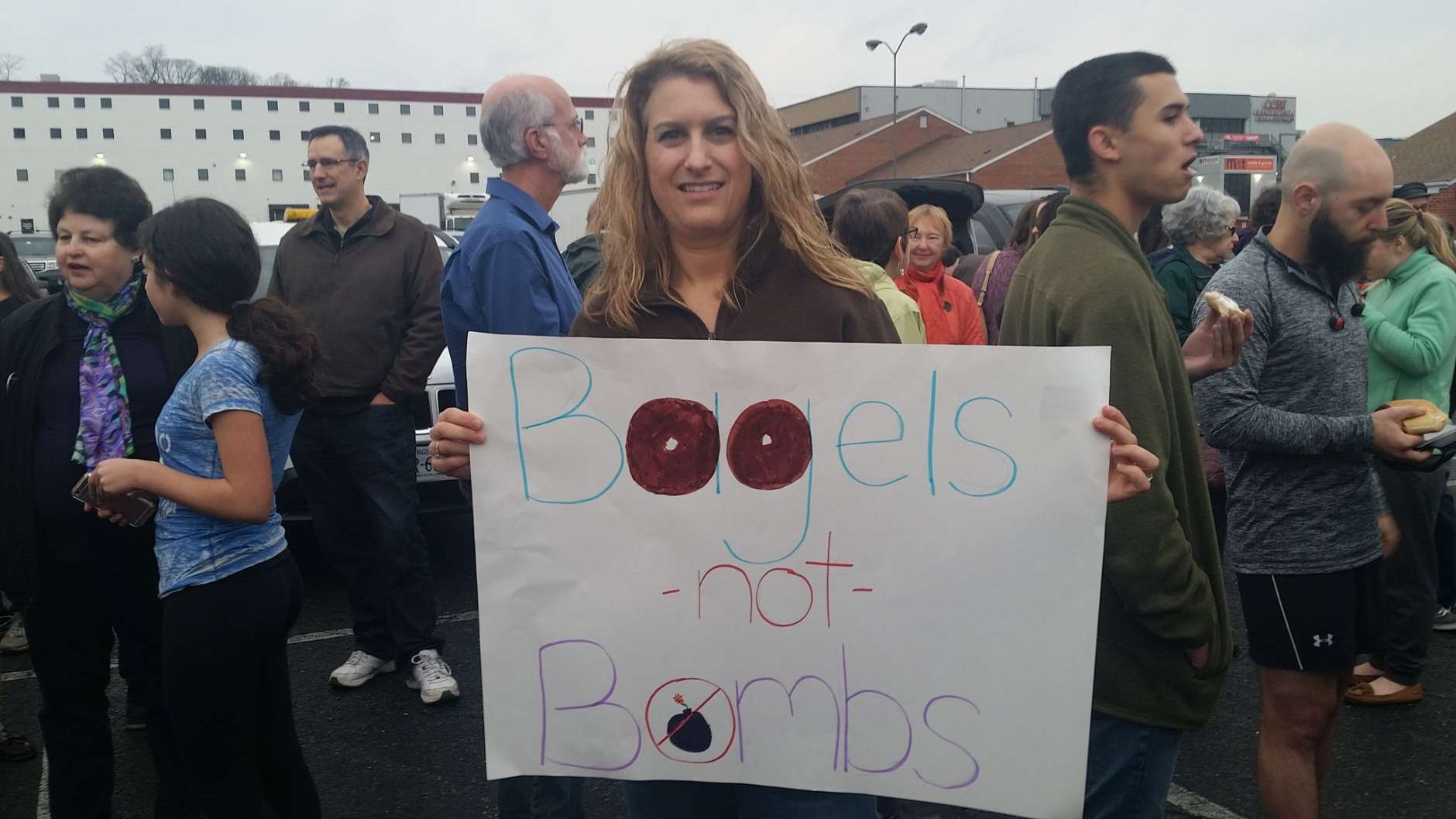 Co-organizer Aviva Goldfarb at Wednesday's Bagels Not Bombs event. (WTOP/Kathy Stewart)