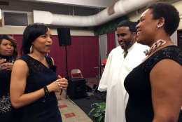 Angela Alsobrooks with Reverend Krishnan Natesan at Love AME church in Bowie, Marland on Sunday. (WTOP/Jenny Glick)
