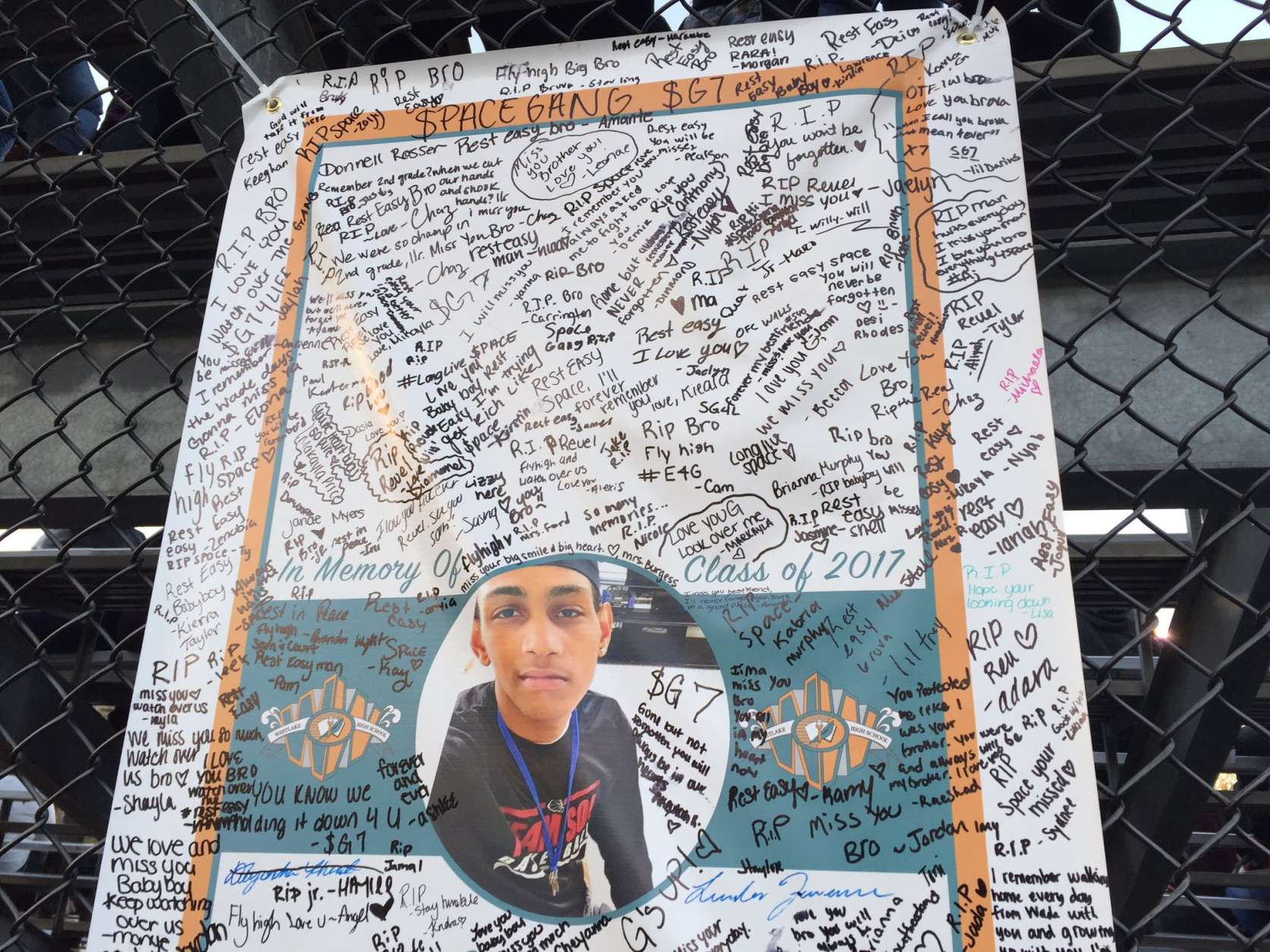 A banner for each senior who passed hangs at the Westlake High School stadium in Waldorf for fellow students to sign. (WTOP/Michelle Basch) 
