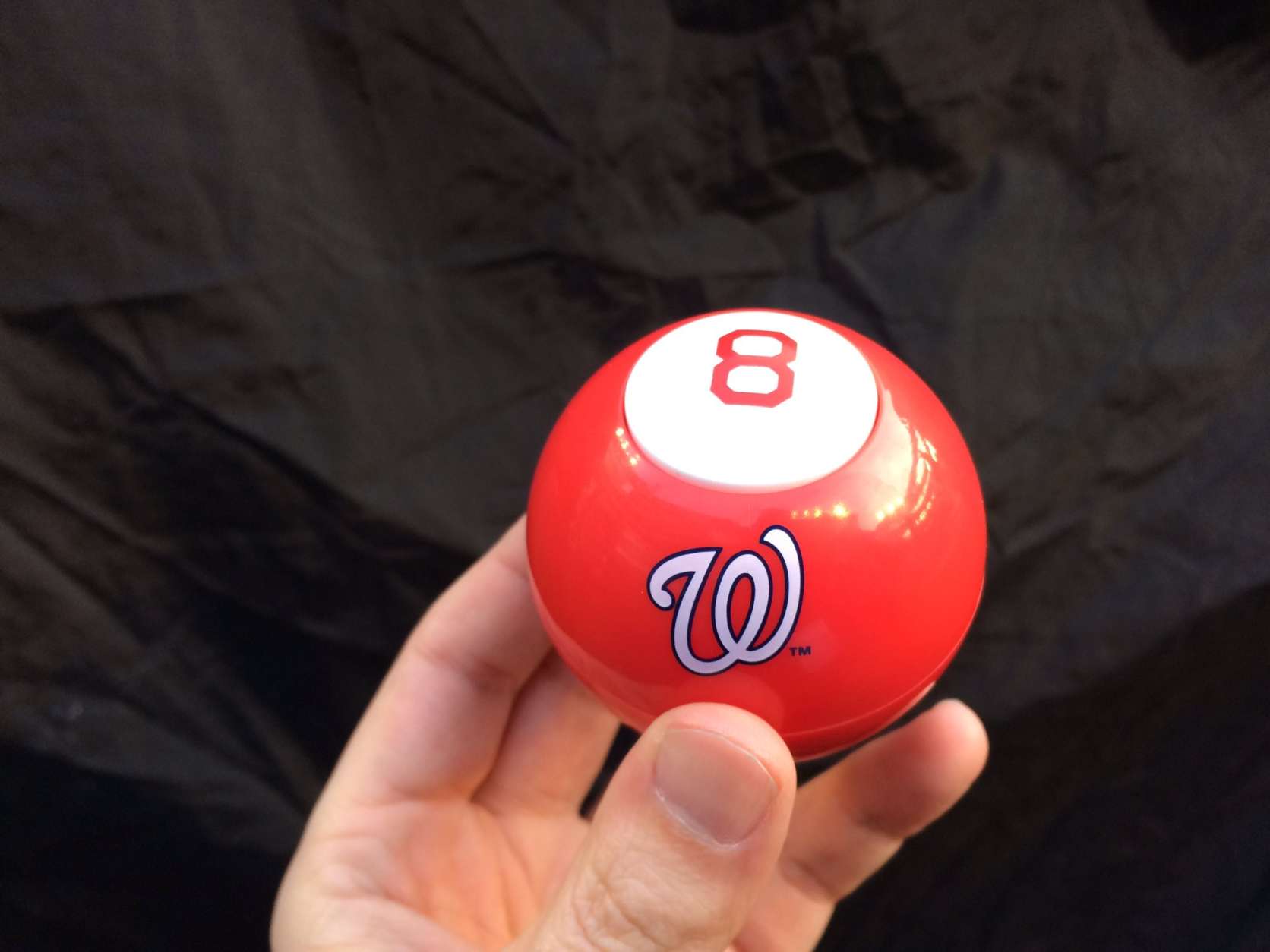 The first 20,000 fans get a special Nationals 2017 magic 8-ball. (WTOP/Nick Iannelli)
