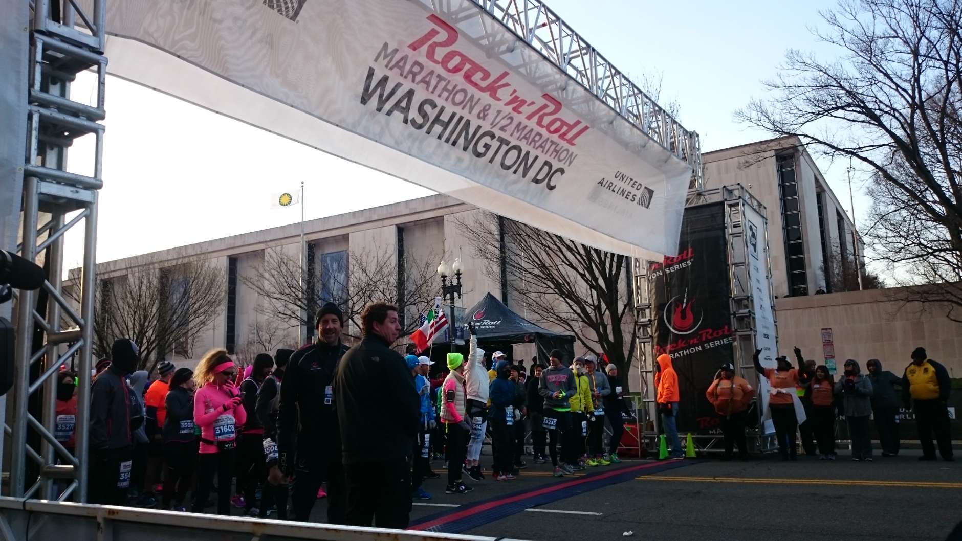 Participants gather at the starting line of the 2017 Rock 'n' Roll Marathon Saturday morning, March 11, on Constitution Ave. NW. (WTOP/Dennis Foley)