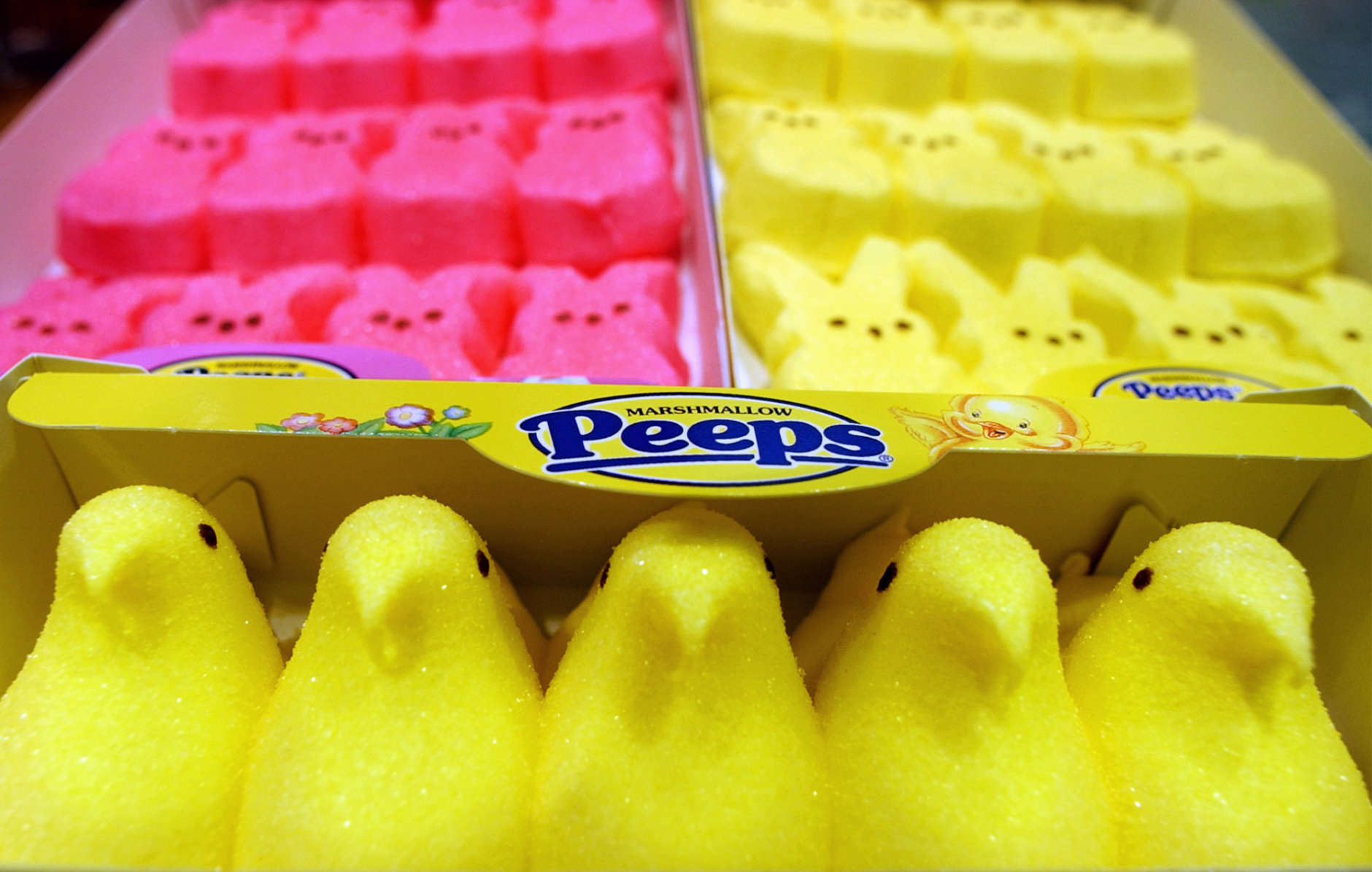 Boxes of Marshmallow Peeps are lined up at the Just Born factory in Bethlehem, Pa., on April 2, 2003. Just Born Inc. is celebrating its 50th year of adorning Easter baskets and satisfying sweet tooths with the colorful confections. (AP Photo/Rick Smith)
