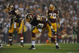 LANDOVER - SEPTEMBER 12:  Andre Carter #99 of the Washington Redskins defends during the NFL season opener against the Dallas Cowboys at FedExField on September 12, 2010 in Landover, Maryland. The Redskins defeated the Cowboys 13-7. (Photo by Larry French/Getty Images)