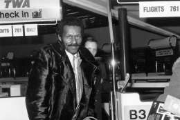1st March 1975:  Legendary rock 'n' roll singer, songwriter and  guitarist Chuck Berry checks in at the airport, March 1975.  (Photo by Evening Standard/Getty Images)