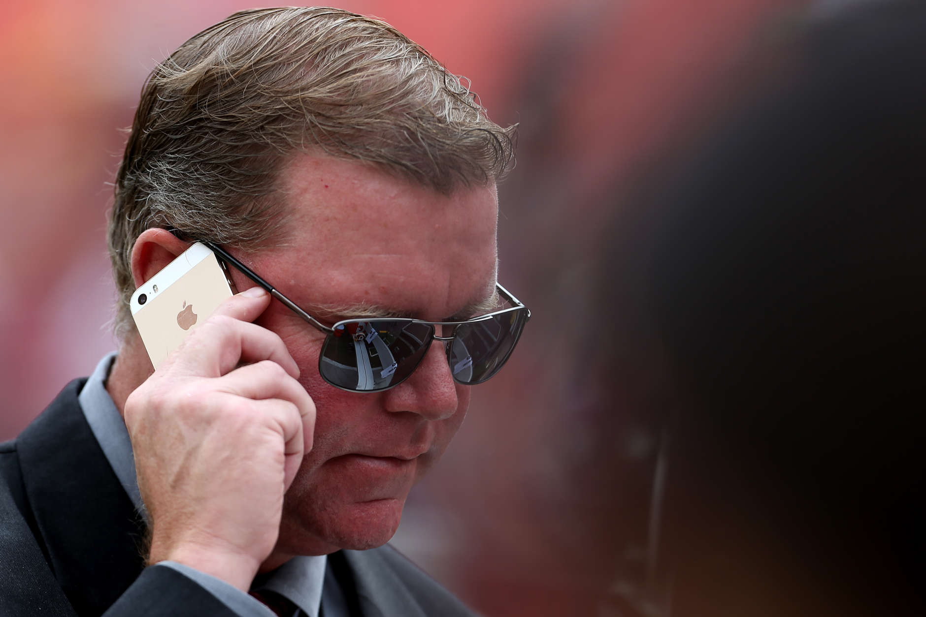 LANDOVER, MD - SEPTEMBER 20: General Manager Scot McCloughan of the Washington Redskins talks on the phone prior to the start of a game against the St. Louis Rams at FedExField on September 20, 2015 in Landover, Maryland. (Photo by Matt Hazlett/Getty Images)