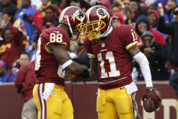 LANDOVER, MD - NOVEMBER 29: Wide receiver DeSean Jackson #11 of the Washington Redskins celebrates with wide receiver Pierre Garcon #88 of the Washington Redskins after scoring a second quarter touchdown against the New York Giants at FedExField on November 29, 2015 in Landover, Maryland. (Photo by Rob Carr/Getty Images)