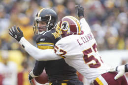 PITTSBURGH - NOVEMBER 28:  Quarterback Ben Roethlisberger #7 of the Pittsburgh Steelers is sacked by linebacker Chris Clemons #57 of the Washington Redskins during the game on November 28, 2004 at Heinz Field in Pittsburgh, Pennsylvania. The Steelers defeated the Redskins 16-7. (Photo by Rick Stewart/Getty Images)