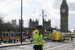 LONDON, ENGLAND - MARCH 22:  Ambulances, police vehicles and emergency services seen on Westminster Bridge on March 22, 2017 in London, England. A police officer was stabbed near to the British Parliament and the alleged assailant shot by armed police. Scotland Yard also reported an incident on Westminster Bridge where one woman has been killed and several people seriously injured by a car.  (Photo by Carl Court/Getty Images)