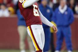 LANDOVER, MD - DECEMBER 21:  Shaun Suisham #6 of the Washington Redskins lines up the field goal kick during the game of the Philadelphia Eagles on December 21, 2008 at FedEx Field in Landover, Maryland.  (Photo by Kevin C. Cox/Getty Images)