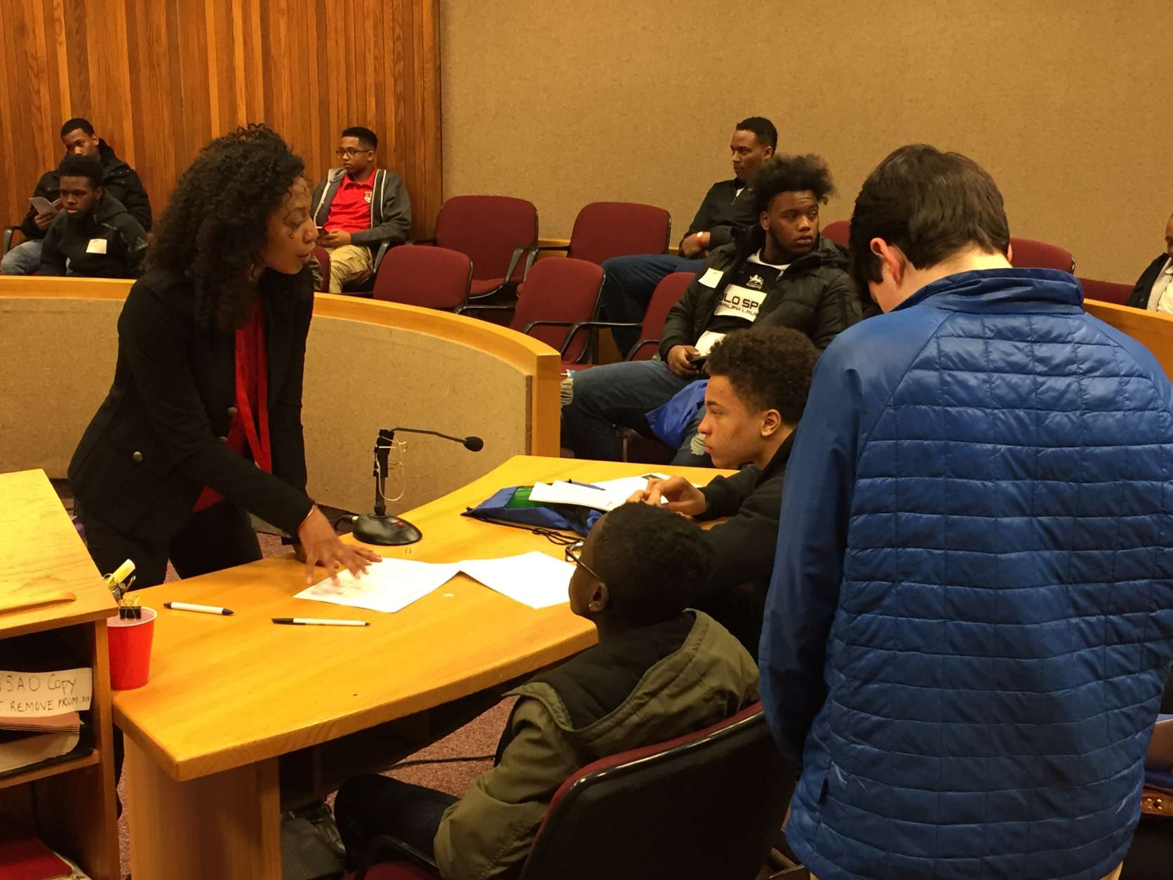 Through the DC Youth Law Fair students explored serving as judges, jury members and attorneys as they worked on a mock case that involved a 15-year-old girl who sent intimate photos of herself to her 18-year-old boyfriend. (WTOP/John Domen) 