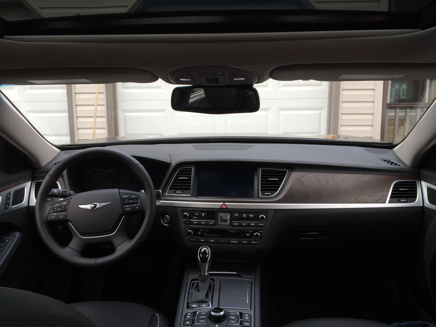 The Genesis G80 has real wood trim and a wealth of soft touch materials in the cabin. (WTOP/Mike Parris)