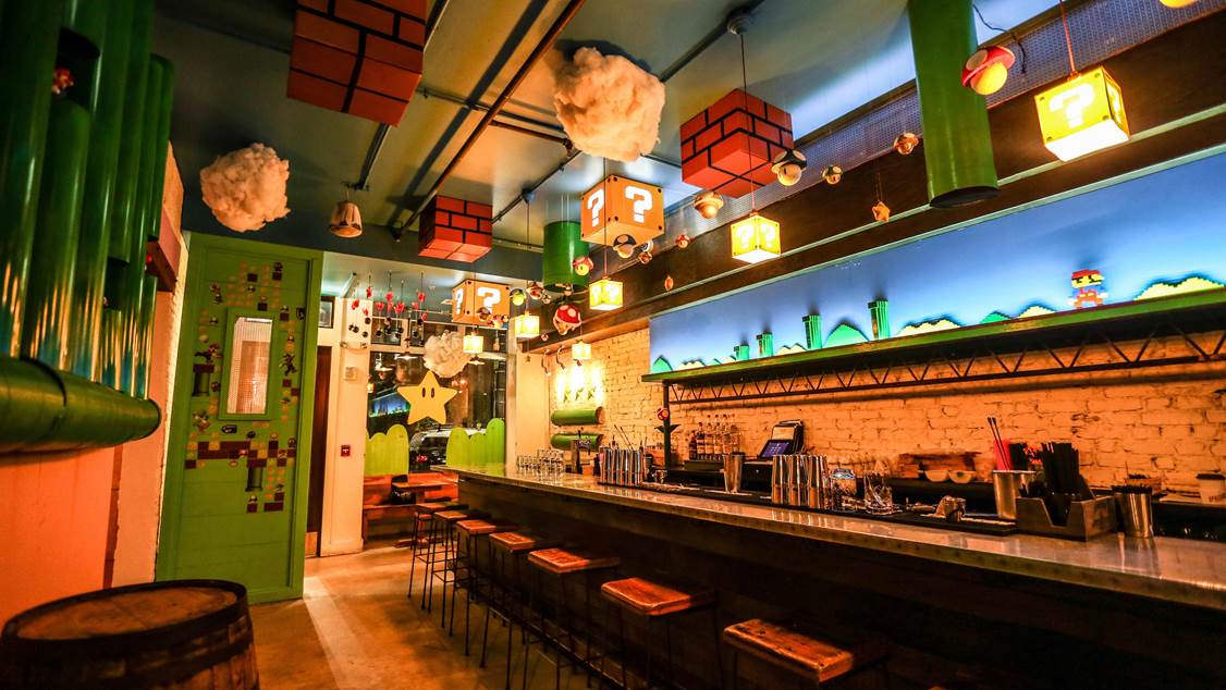 “You’re in what we affectionately refer to as ‘Mario Bar,’” Brown said about the temporarily redecorated Mockingbird Hill. “[On this side of the bar] we wanted to do something that was an homage to Japan and one of its most famous exports: Mario Brothers.” (Photo by Farrah Skeiky)