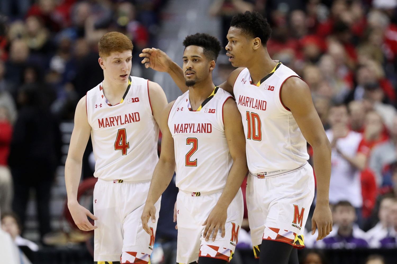 WASHINGTON, DC - MARCH 10: Kevin Huerter #4, Melo Trimble #2, and L.G. Gill #10 of the Maryland Terrapins talk on the floor during the first half against the Northwestern Wildcats during the Big Ten Basketball Tournament at Verizon Center on March 10, 2017 in Washington, DC.  (Photo by Rob Carr/Getty Images)