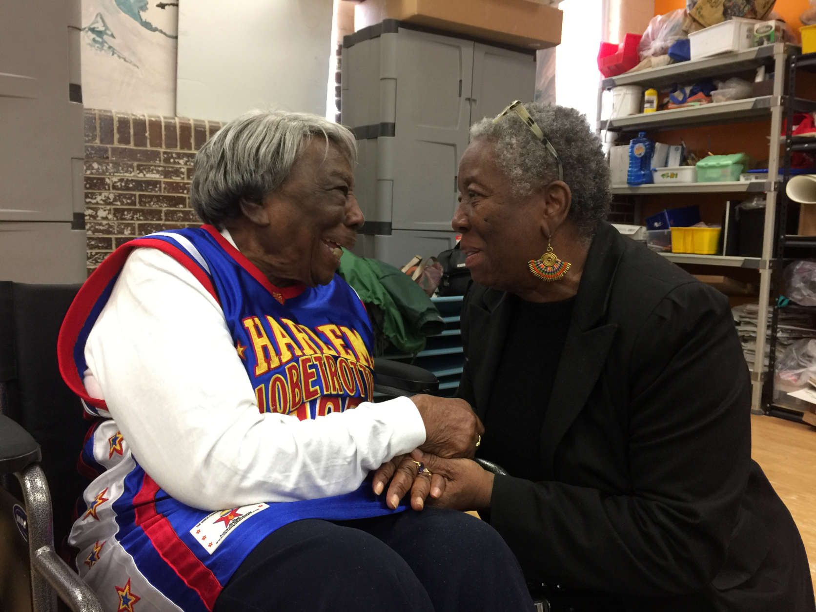 D.C. resident Virginia McLaurin speaks with Diane Cottman, executive director of the Latin American Montessori Bilingual Public Charter School, Monday during a birthday celebration for McLaurin on Monday, March 13, 2017. McLaurin who 108 a day earlier. (WTOP/Kristi King)