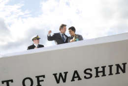 Captain Nate Handy and Entertainment Cruises CEO Kenneth Svendsen join DC Mayor Muriel Bowser in christening the new Spirit of Washington Yacht at The Wharf's Pier 4 Tuesday afternoon. (Jason Dixson Photography)
