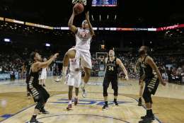 Virginia Tech forward Zach LeDay (32) puts up a shot against Wake Forest during the first half of an NCAA college basketball game in the second round of the ACC tournament, Wednesday, March 8, 2017, in New York. Virginia Tech won 99-90. (AP Photo/Julie Jacobson)