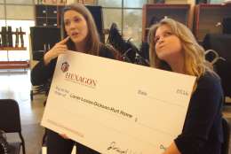 Donations and ticket sales determine the size of the check HEXAGON will donate to charity at the end of its Spring run on April, 1. WTOP's Megan Cloherty and Jamie Forzato volunteered with Hexagon in 2016. That check ended up being filled out for $60,000. (Courtesy Gene Tighe)