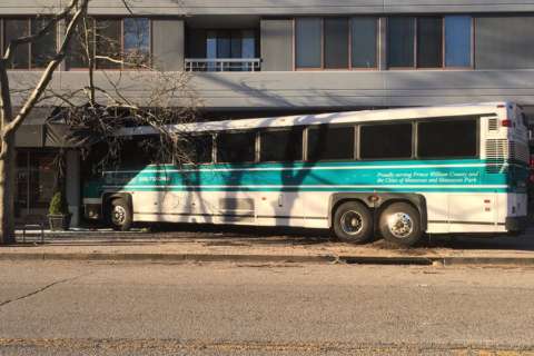 Bus crashes into Arlington storefront (Photos)