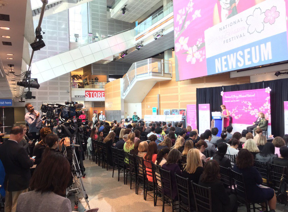 People and media await announcement of the cherry blossom peak dates at the Newseum in Washington, D.C. on March 1. (WTOP/Kristi King)