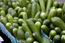 Cucumbers and other fresh produce are displayed for sale at a farmers market in Arlington, Va., Saturday, April 13, 2013.  (AP Photo/J. Scott Applewhite)