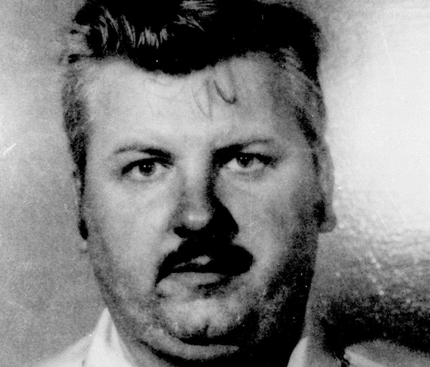 FILE - This 1978 file photo shows serial killer John Wayne Gacy. Detectives who have long wondered if Gacy killed others besides the 33 young men he was convicted of murdering may soon get to search for bodies underneath an apartment complex where his late mother once lived, a law enforcement official said Saturday, Jan. 12, 2013. (AP Photo/File)