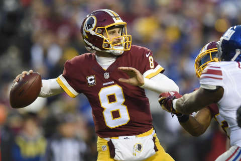 The Latest: Redskins QB Cousins signs franchise tag contract