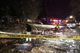 In this photo provided by the Montgomery County fire &amp; Rescue Service, emergency personnel work at the scene of a leveled house in Rockville, Md., Friday, March 17, 2017. Authorities said the explosion occurred about 1 a.m. Friday and reduced the home to a "pile of bricks." (Montgomery County fire &amp; Rescue Service via AP)