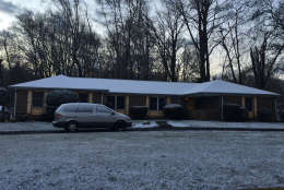 A light dusting of snow coats a house in Rockville on Friday morning. (WTOP/Dennis Foley)